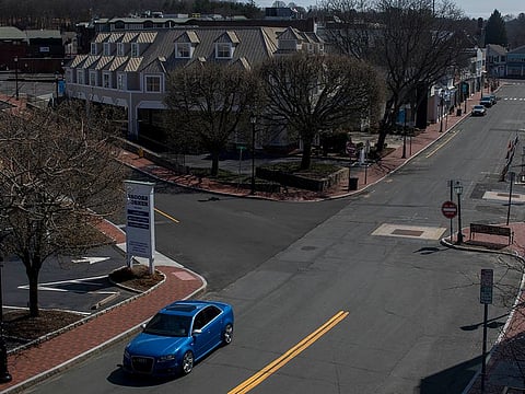 Main Street in Westport, Conn., March 22, 2020. About 50 people gathered this month for a party in the upscale suburb of Westport, then scattered across the region and the world, taking the coronavirus with them.