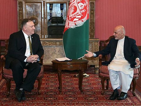 Afghanistan's President Ashraf Gani speaks with US Secretary of State Mike Pompeo (L) during their meeting in Kabul. US Secretary of State Mike Pompeo arrived in the Afghan capital on March 23 amid an ongoing political crisis, a raging Taliban insurgency and rising coronavirus cases - all of which further threaten an already-floundering peace process.
