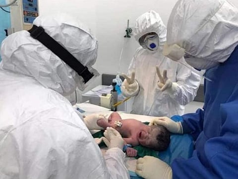 So far, the baby shows no signs of being infected by the coronavirus.