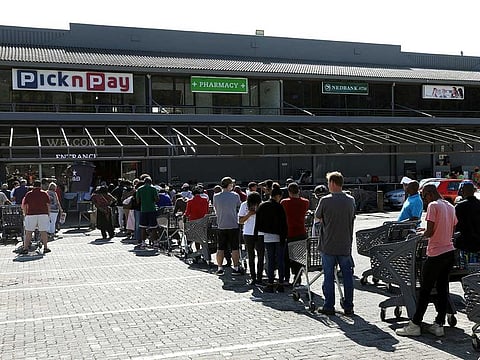 File picture: Shoppers queue to stock up on groceries at a Pick n Pay store during a nationwide lockdown of 21 days to try to contain the coronavirus disease (COVID-19) outbreak, in Johannesburg on March 24, 2020. 