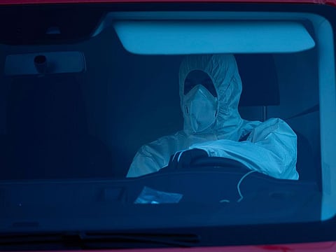 A spanish UME (Emergency Army Unit) soldier drives into Madrid's ice rink turned into a temporary morgue due the COVID-19 crisis in Madrid, Spain, Monday, March 23, 2020