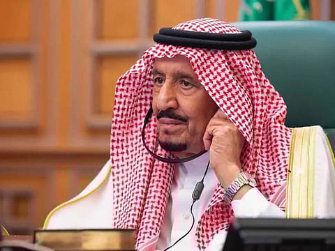 Saudi Arabia's King Salman chairs a video call of G20 leaders and other international bodies from his office in Riyadh on March 26, 2020.