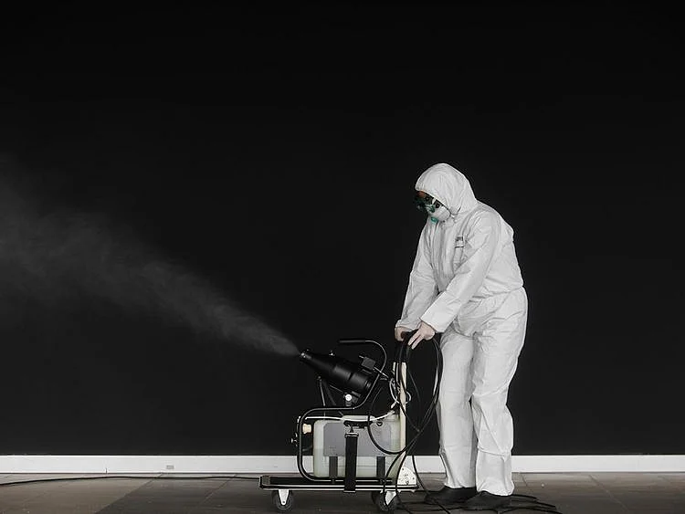 A municipal worker disinfect a warehouse with hospital material, to stop the spread of coronavirus disease (COVID-19) in Cascais, Portugal March 27, 2020.  