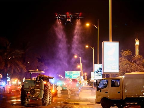 Dubai Municipality workers conduct the National Disinfection Programme on Jumeirah Road.