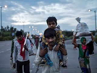 India’s migrant workers face long walk home amid COVID-19 lockdown