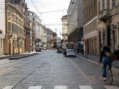 Via Manzoni, which is usually a busy street in Milan, is nearly deserted  