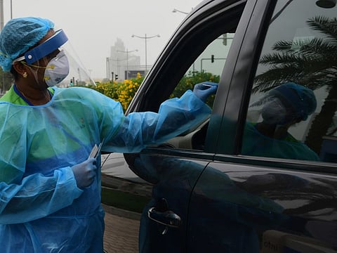 Al Futtaim group launched a COVID-19 drive through testing centre managed by HealthHub for it’s employees at Festival City in Dubai. PHOTO:Sankha Kar