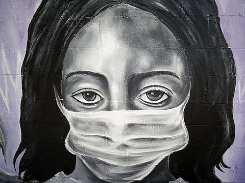 A painting by the graffiti artist Bandit titled Our Nurses, Our Saints is seen on a wall in the lower ninth ward in New Orleans, Louisiana, on April 03, 2020. 