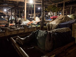 Photos: Ugandan vendors sleep in markets to curb the spread of coronavirus