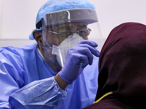 COVID-19: A doctor tests a woman at a hospital in the southern Lebanese city of Nabatieh on April 4, 2020