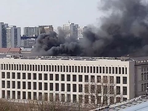 Smoke rises over the Berlin Palace (Stadtschloss) in Berlin, Germany April 8, 2020 in this screen grab obtained from a social media video. 