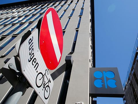 The logo of the Organization of the Petroleoum Exporting Countries (OPEC) and a traffic sign are seen outside of OPEC's headquarters in Vienna, Austria April 9, 2020. 