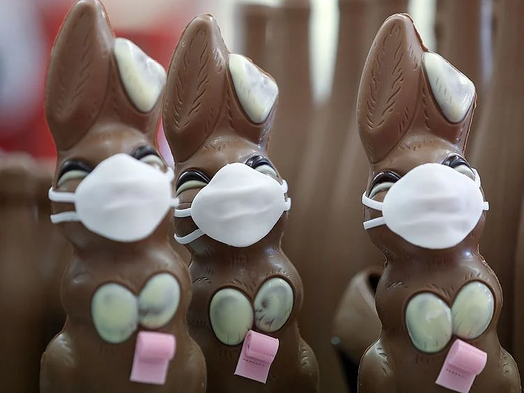 Chocolate Easter Bunnies with a protective mask and a roll of toilet paper are seen at a chocolate factory in Pirmasens, Germany, April 9, 2020, as the spread of the coronavirus disease (COVID-19) continues. REUTERS/Ralph Orlowski