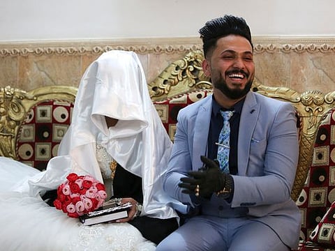 COVID-19: Iraqi couple gets police help to wed amid coronavirus curfew
