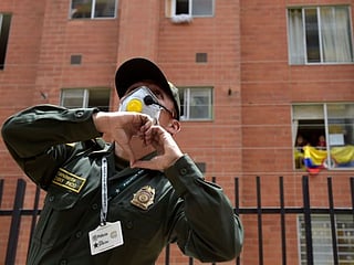 Colombian police dance with residents amid COVID-19 lockdown