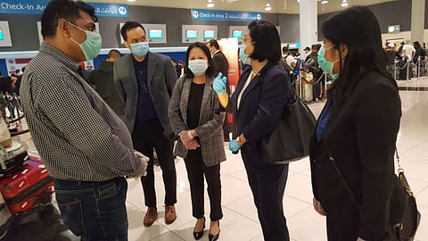 Philippine Ambassador Hjayceelyn Quintana (2nd from right), accompanied by Vice Consul Marianne Bringas and Labour Attache Felicitas Bay, oversaw the repatriation of Filipino crew members of Norwegian Cruise Lines Holdings on April 11. Photo taken at DXB Terminal 2