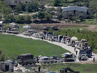 Displaced Syrians wary of COVID-19 risk return to war-torn Idlib