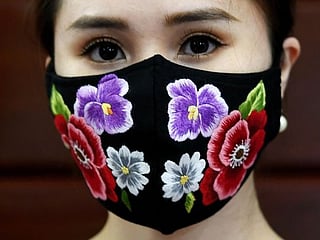 Vietnamese designer adds style into COVID-19 face masks