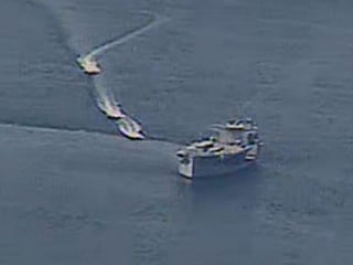 Iranian vessels come close to US Navy ships in Arabian Gulf