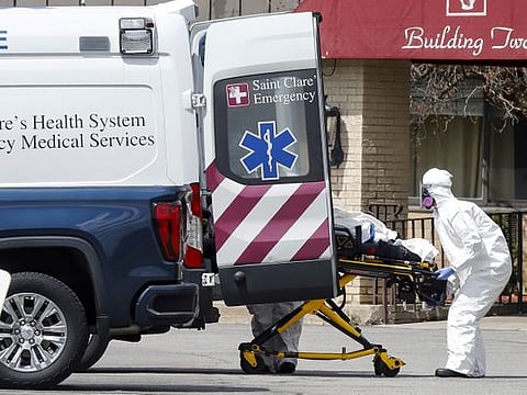 Healthcare officials load a patient into an ambulance at Andover Subacute and Rehab Center, during the coronavirus disease (COVID-19) outbreak, in Andover, New Jersey, US