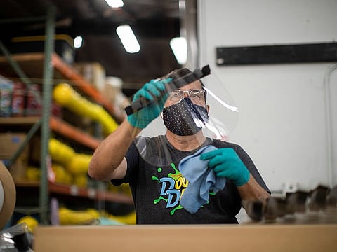 Foreman Rene Fresquez inspects a face shields at movie props company Arete which transitioned its entire workforce to producing medical equipment during the global outbreak of the coronavirus disease (COVID-19), in North Hollywood, California, U.S., April 16, 2020.