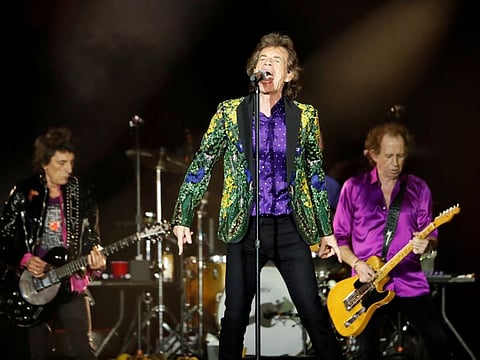 FILE PHOTO: Mick Jagger, Keith Richards and Ronnie Wood of The Rolling Stones perform during their No Filter U.S. Tour at Rose Bowl Stadium in Pasadena, California, U.S., August 22, 2019. REUTERS/Mario Anzuoni/File Photo