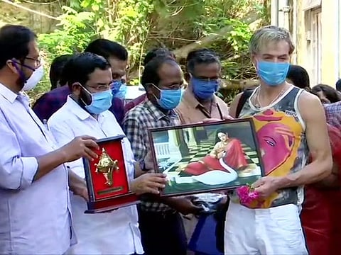Italy's Roberto Tonizzo (right), who had tested positive for COVID19 on March 13 while visiting Varkala of Thiruvananthapuram district, left for Bengaluru after making a full recovery, on Monday. 
