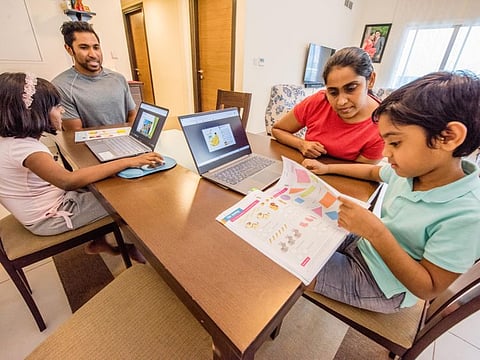 Left to Right, Ayanca Deanne, Nalin Fernando, Nirmali Fernando and Aidan Fernando, doing e-learning from home during the Dubai lockdown in their appartment in Al Nada. Dubai. Photo: Antonin Kélian Kallouche/Gulf News