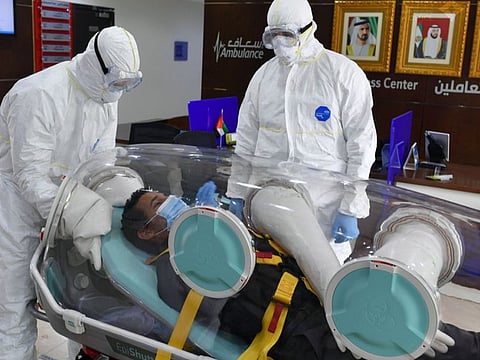 Paramedics in Dubai use single-patient isolation pods called Epishuttles to enable safe transport of severe cases