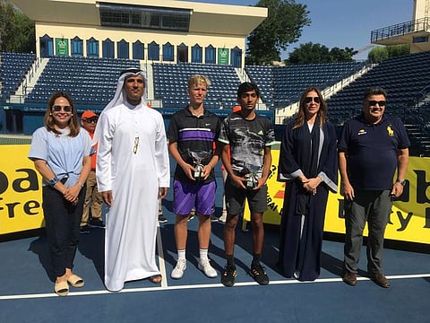 Nasser Al Marzouqi, General Secretary of UAE Tennis Federation (second left), poses with winners of a junior event in Dubai. 