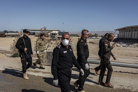 Iraqi military officials at the Al Zurbatiya border crossing with Iran. With the coronavirus raging in Iran, a push to distance their country from their neighbor has gained broader appeal in Iraq.