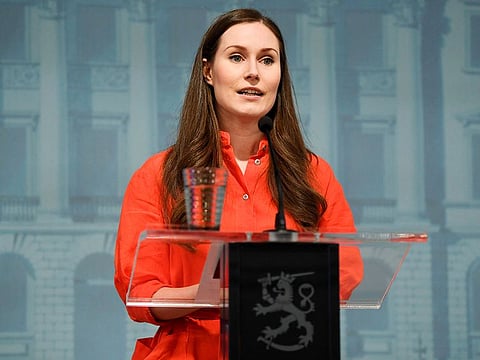 Finland's Prime Minister Sanna Marin gives an update about the COVID-19 situation, during a press conference in Helsinki, on Wednesday April 22, 2020. AP