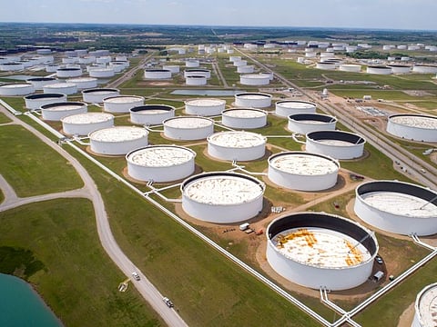 FILE PHOTO: Crude oil storage tanks are seen in an aerial photograph at the Cushing oil hub in Cushing, Oklahoma, U.S. April 21, 2020. 