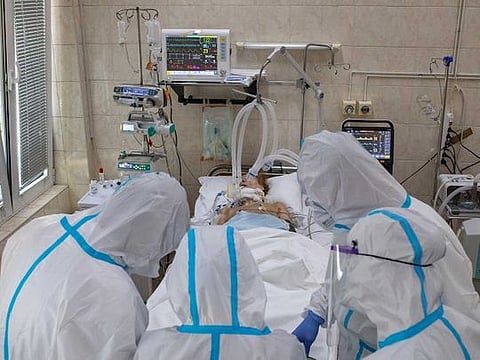 Medical workers treat a patient suffering from the coronavirus disease (COVID-19) inside the Intensive Care Unit at the Hospital for Infectious and Tropical Diseases of the Clinical Center of Serbia in Belgrade, Serbia, April 24, 2020. 