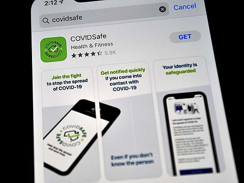 A photo illustration shows a new COVIDSafe app by the Australian government as seen on an Iphone to install in Sydney on April 27, 2020.  More than two million Australians have downloaded a new government smartphone app designed to make coronavirus contact tracing easier, as the country moves to ease stay-at-home restrictions.