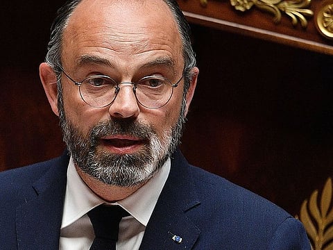 French Prime Minister Edouard Philippe  delivers a speech as he presents the government's plan to exit from the lockdown situation at the French National Assembly in Paris on April 28, 2020.