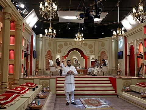 Aamir Liaquat Hussain, host of the Express TV channel programme "Piyara Ramzan", speaks during a live show, as the coronavirus disease (COVID-19) outbreak continues in Karachi, April 25.