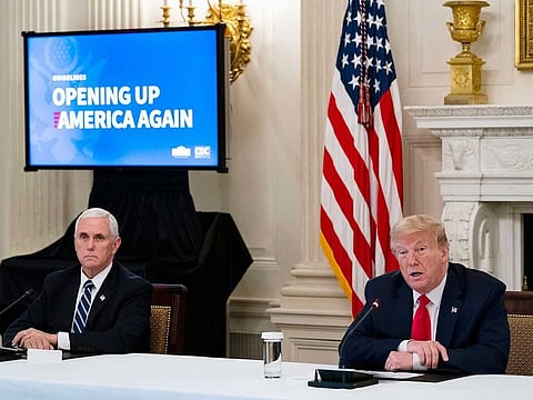 President Donald Trump and Vice-President Mike Pence participate in a roundtable with industry executives on the plan for Opening Up America Again, at the White House in Washington, Wednesday, April 29, 2020.