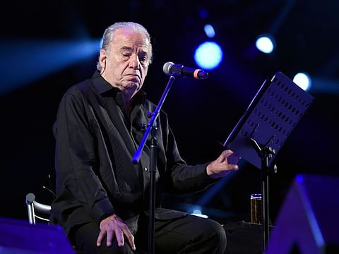 (FILES) In this file photo taken on March 16, 2019 Mexican singer-songwriter Oscar Chavez performs during the first day of the "Vive Latino" music festival in Mexico City. Mexican protest singer Oscar Chavez has died at the age of 85, a Tweet on his personal Twitter account announced on April 30, 2020, though no cause of death has been confirmed. A Tweet sent a day earlier and signed by his staff indicated he had been hospitalized with COVID-19 symptoms.  / AFP / Alfredo ESTRELLA