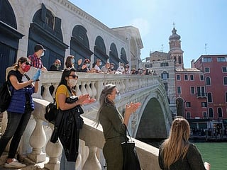 A masked world opens up as countries ease lockdown