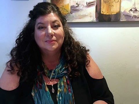 Tara Reade poses for a photo during an interview in Nevada City, California on April 4, 2019. Reade has said that the former US vice-president Joe Biden “should not be running on character”. 