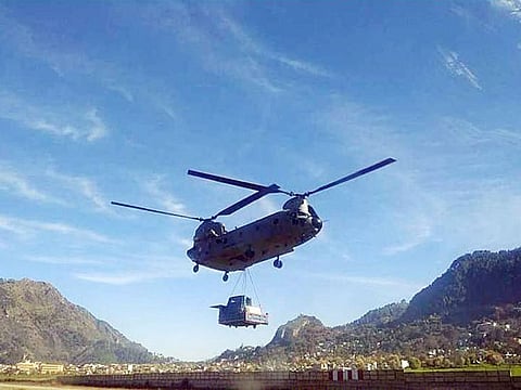 A Chinook helicopter carries equipments to Gunji as Border Roads Organisation connected Kailash Mansarovar route to Lipulekh pass at a height of 17,060 ft, providing connectivity to border villages & security forces, on Friday. 