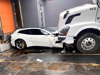 Angry trucker drives over boss’s Ferrari