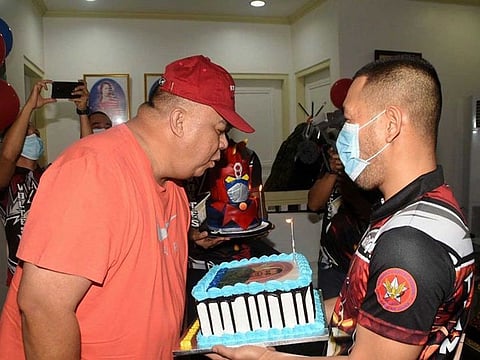 Metro Manila police chief Maj. Gen. Debold Sinas blows his birthday cake in this photo posted by the National Capital Region Police Office's (NCRPO) public information office on Facebook, May 8, 2020.