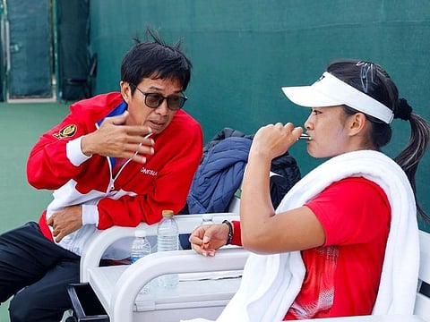 Priska Madelyn Nugroho (right) with her coach during Indonesia's Fed Cup campaign in Dubai earlier this year.