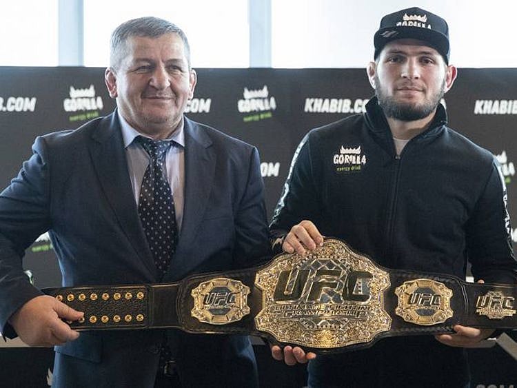 Abdulmanap Nurmagomedov, the father and longtime trainer of UFC star Khabib Nurmagomedov, with his son