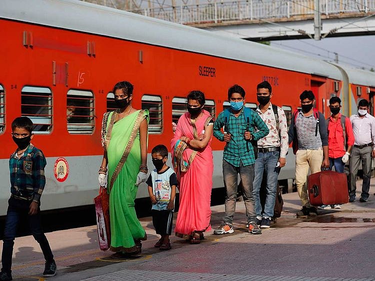 Migrant  labourers from Punjab Fatehpur Uttar Pradesh India railway train