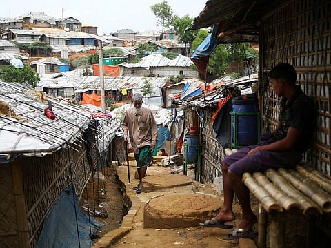 A Rohingya refugee walks at a refugee camp in Cox's Bazar, Bangladesh, March 7, 2019. 