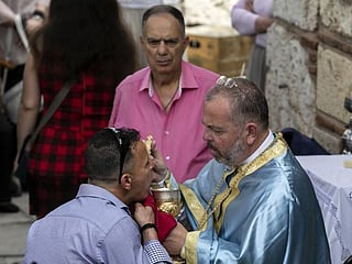 Photos: Churches in Greece open doors after two months