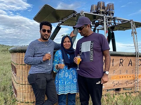Sabeena (middle) with son Mujtaba (left) and husband Inayat (right) seen here during happier times 